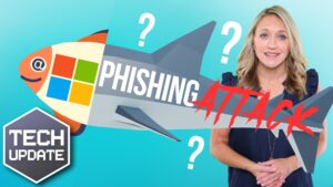 A woman stands next to a graphic of a shark with a Microsoft logo and the words "Phishing Attack" on a turquoise background with "Tech Update" in a hexagon at the bottom left corner.