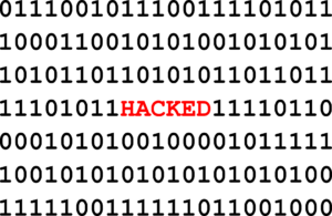 A sequence of black binary code with the word "HACKED" in red text in the center, illustrating how to tell if your computer is hacked.